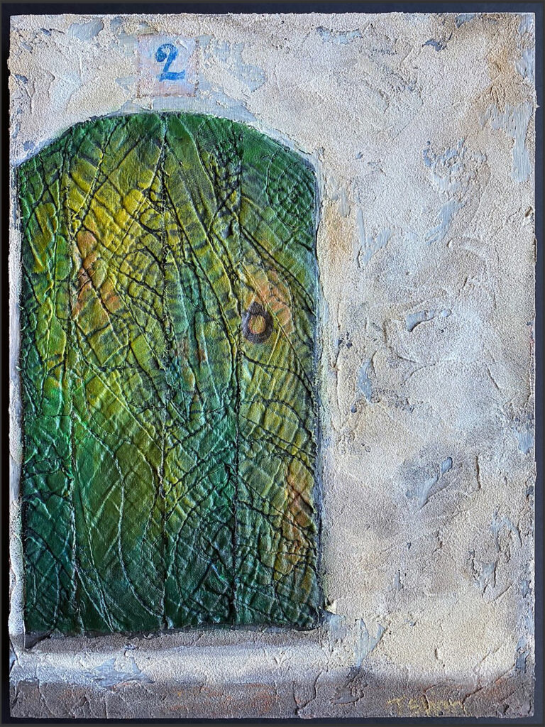 "Lyon" 9x12x1 wood panel with quilt remnants and acrylics (door)